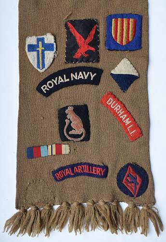ATS Scarf with various formation badges, titles etc sewn on it