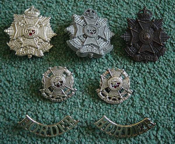 Cap badges of the Border Regt