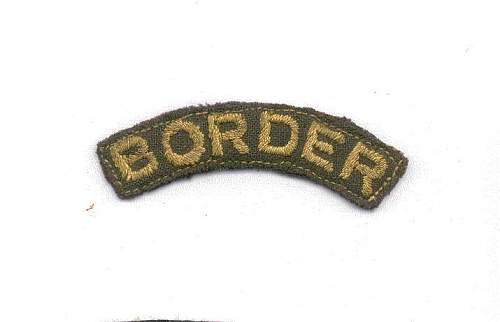 Cap badges of the Border Regt