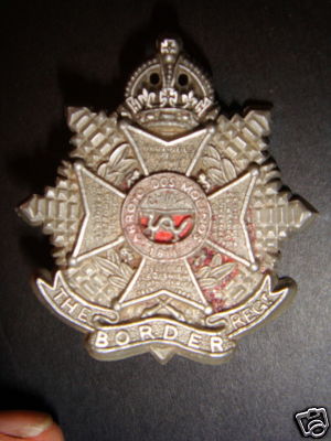 Cap badges of the Border Regt