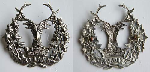 Cap badges from a trade