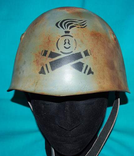 Is this WW2 Italian M33 helmet 100% Original?