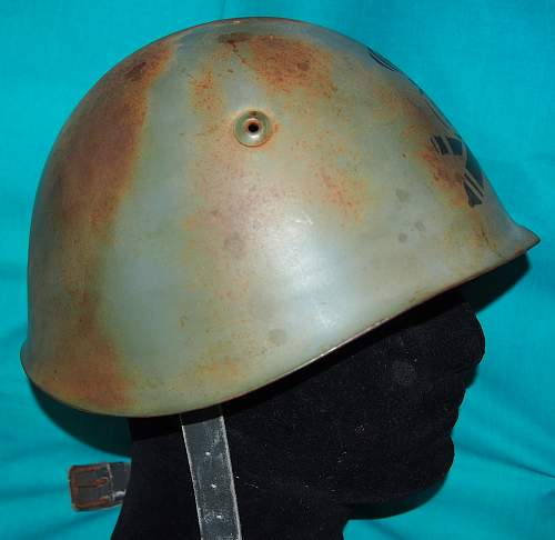 Is this WW2 Italian M33 helmet 100% Original?