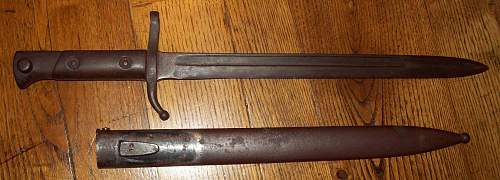 Thoughts on this Italian M91(?) Bayonet and Scabbard?