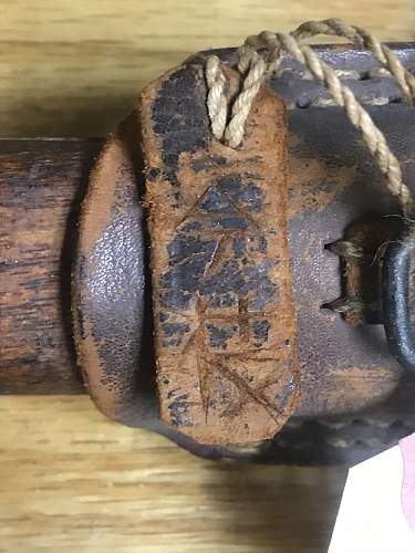 leather tag on japanese bayonet translation please.