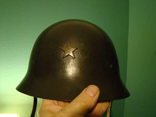 is this a WWII Japanese helmet or Swedish M26 helmet made to look like one?