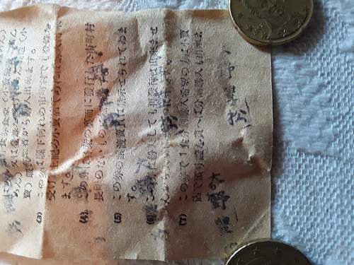 Help  translation of old paper from japanese ww2 tunic