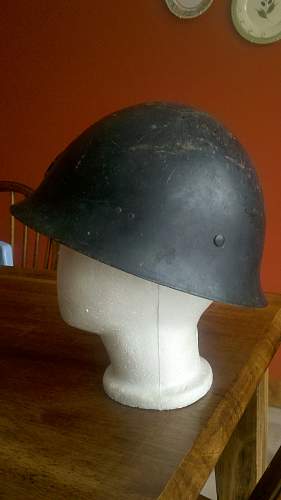 Japanese helmet, complete and period painted flat black