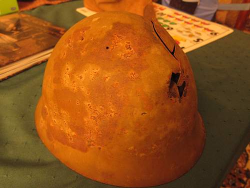 Japanese helmet, machine gun damage, japanese text inside cloth cover, translation?