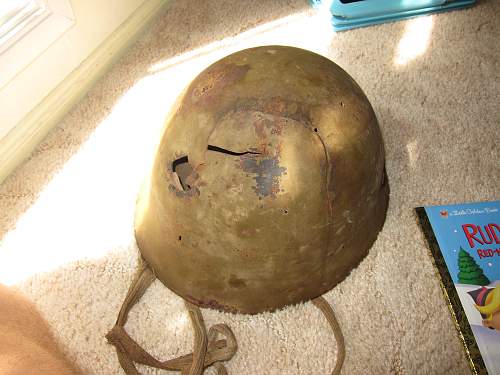 Japanese helmet, machine gun damage, japanese text inside cloth cover, translation?