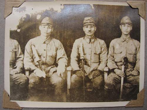 Japanese helmet, machine gun damage, japanese text inside cloth cover, translation?