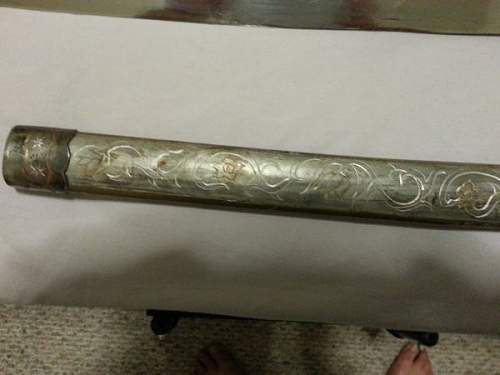 Help with identifying Japanese sword please