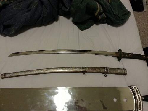 Help with identifying Japanese sword please