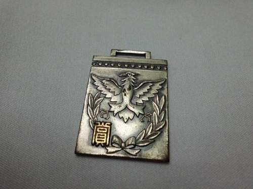 Can anyone help with this Japanese Badge??