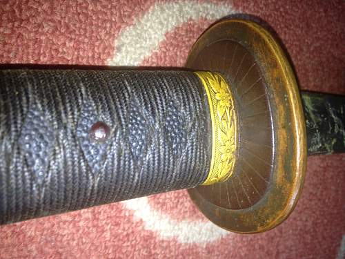 Can anyone identify my Grand Father Japanese Sword