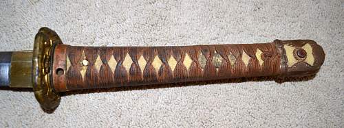 WW2 Japanese sword;need help with identification, please .