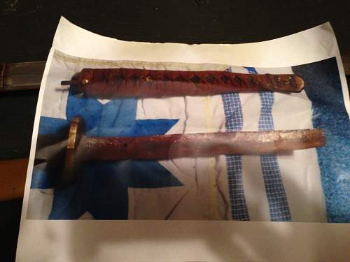 Hello I picked up this WW2 Japan sword