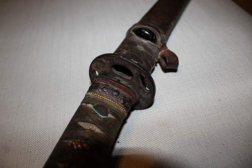 Looking for help identifying sword