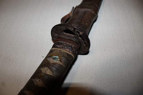 Looking for help identifying sword