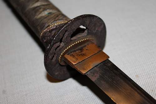 Looking for help identifying sword