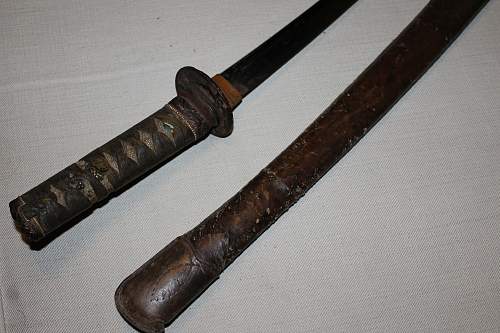 Looking for help identifying sword