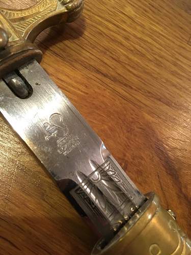 Kriegsmarine 2nd model Eickhorn etched dagger - Help Needed with portepee