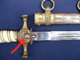 Why Kriegsmarine daggers and swords have locks
