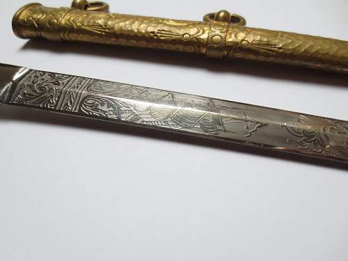 Imperial Kreigsmarine unmarked etched dagger with ivory grip and deluxe scabbard in mint condition