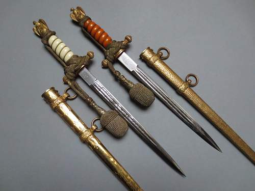 Kriegsmarine 2nd model WKC etched daggers with white and orange grip