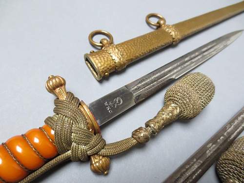 Kriegsmarine 2nd model WKC etched daggers with white and orange grip