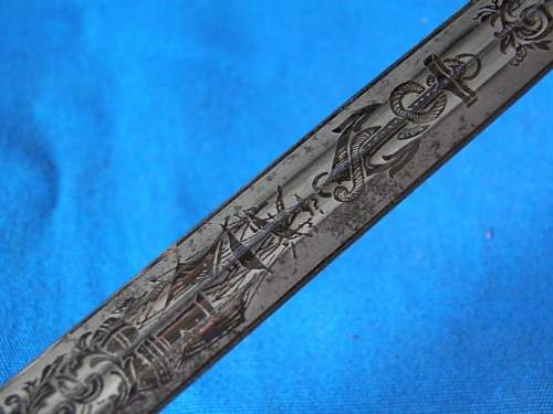 Kriegsmarine 1st model WKC etched dagger with m38 pommel portepee and orange grip