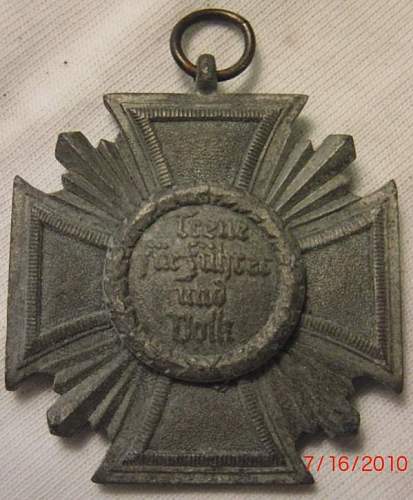 4 German Medals/pins: Eisernes Kreuz, Kriegsverdienstkreuz, NSDAP Dienstauszeichnung in Bronze, and hat pin.