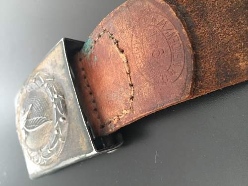 Unmarked steel buckle