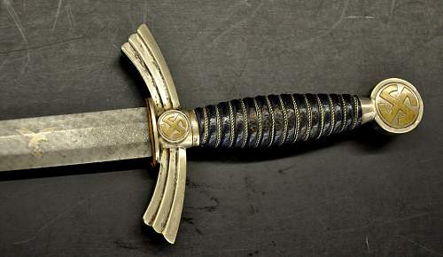 1st Model  w/ Damascus pattern blade @ auction