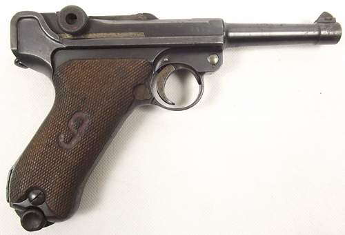 Luger 1916 with &quot;red nine&quot; on grips.