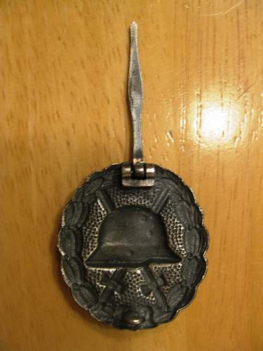 Suspicious Silver Wound Badge