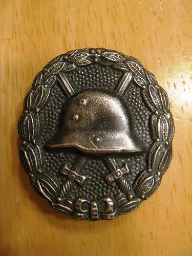 Suspicious Silver Wound Badge