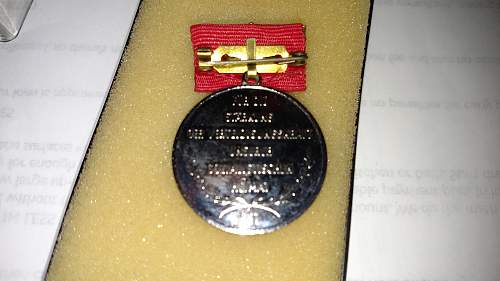 Ernst Schneller medal.