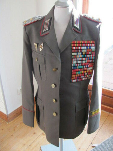 Stasi tunic with red piping and gold cuff title?