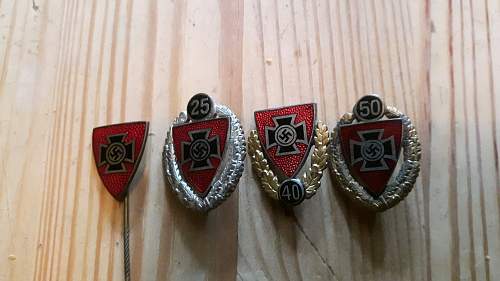 Original Nationalsozialistische Reichskriegerbund stickpin and members badges?