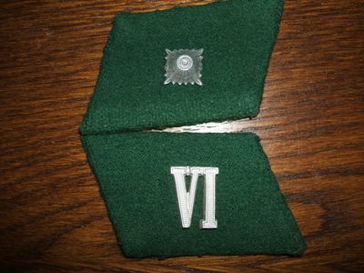 Unknown collar tabs