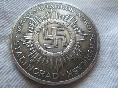 Original or fake? 64th Motorcycle Battalion 14th Panzer Division medal.