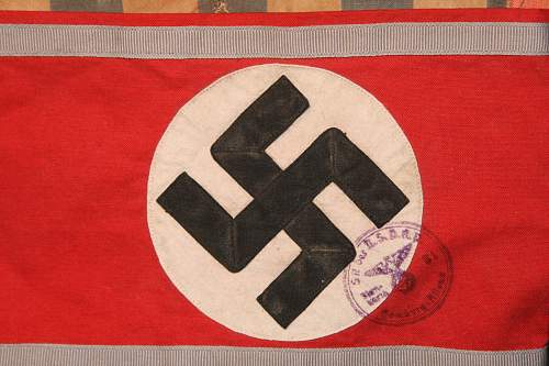 Unusual armband with nsdap acceptance stamp overlaying the nazi cross ?