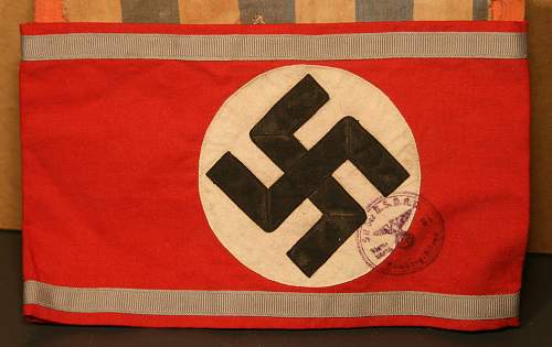 Unusual armband with nsdap acceptance stamp overlaying the nazi cross ?