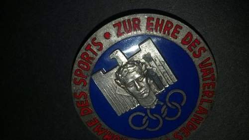 Olympic badge for sale.