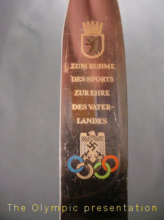 Olympic badge for sale.