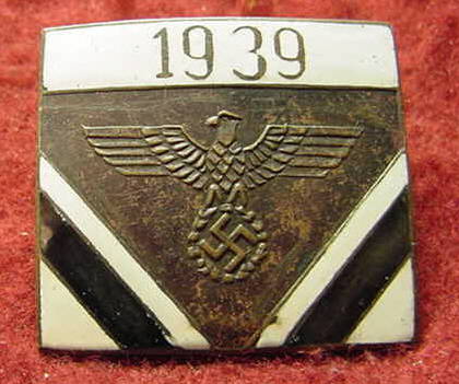 Pins/Badges Marked Wolfschanze on reverse.  Can anyone help identify/authenticate?