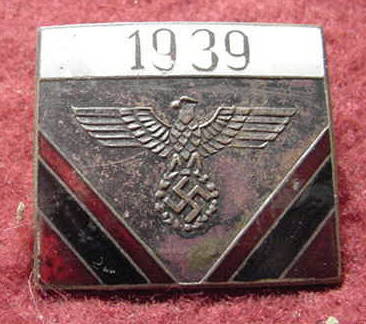 Pins/Badges Marked Wolfschanze on reverse.  Can anyone help identify/authenticate?