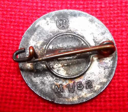 Real or fake NSDAP Badge pins?