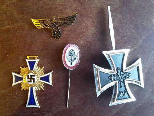 Found multiple badges and pins.